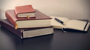 Close up of books - False Claims Act and the CHOICE Act