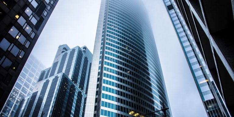 Gray High Rise Buildings, representing CFTC's Self-Reporting Program