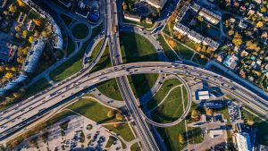 Aerial Photo of Buildings and Roads - Safety of Nation’s Highway Guardrails on Trial, representing NHTSA whistleblower