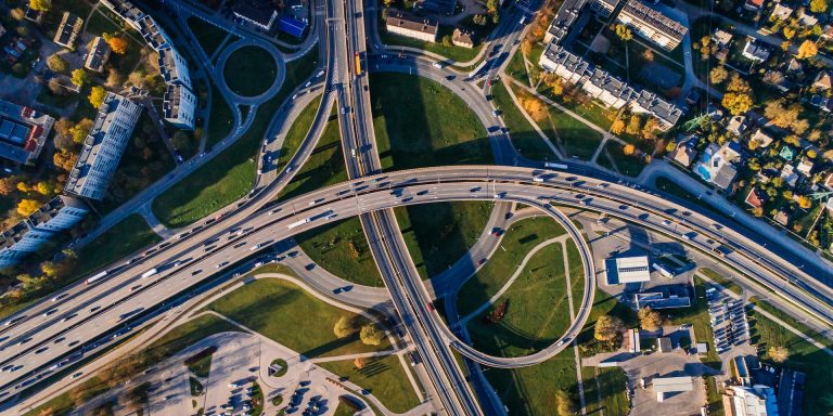 Aerial Photo of Buildings and Roads - Safety of Nation’s Highway Guardrails on Trial, representing NHTSA whistleblower