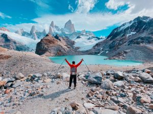 A Hiker at the Edge of a Scenic Landscape