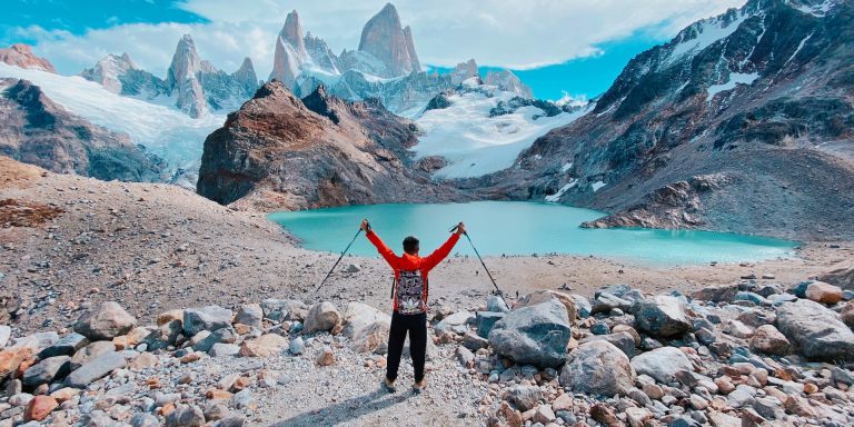 A Hiker at the Edge of a Scenic Landscape