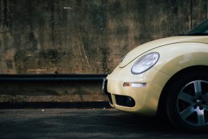 Beige Volkswagen Beetle, representing the $4 Billion Fine for Volkswagen and NHTSA Whistleblower Rules