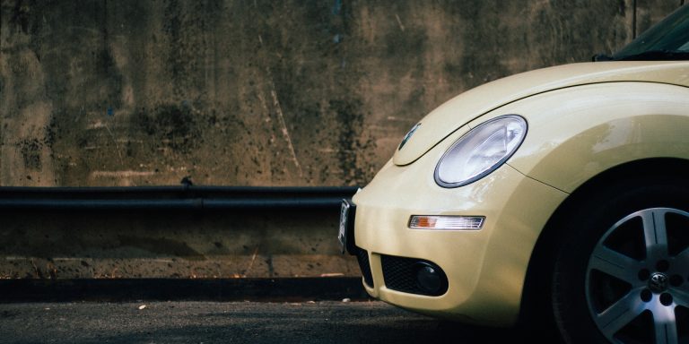 Beige Volkswagen Beetle, representing the $4 Billion Fine for Volkswagen and NHTSA Whistleblower Rules