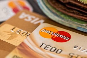 Close-up Photography Two Brown Cards, representing foreign currency