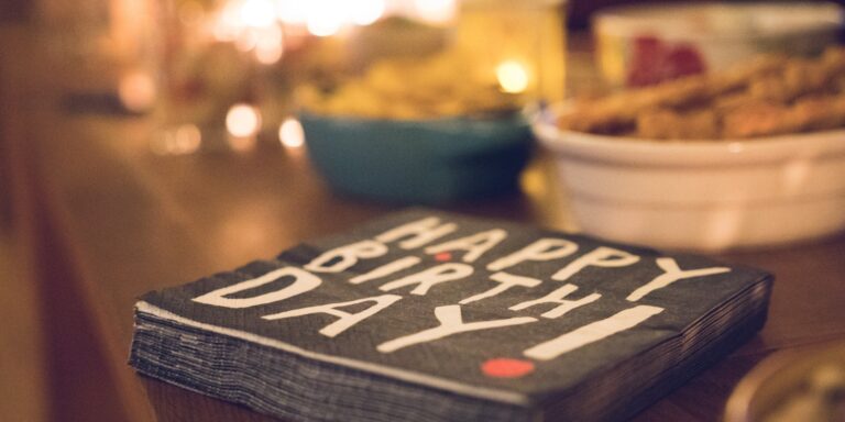 Birthday Napkins on a Table with Snacks