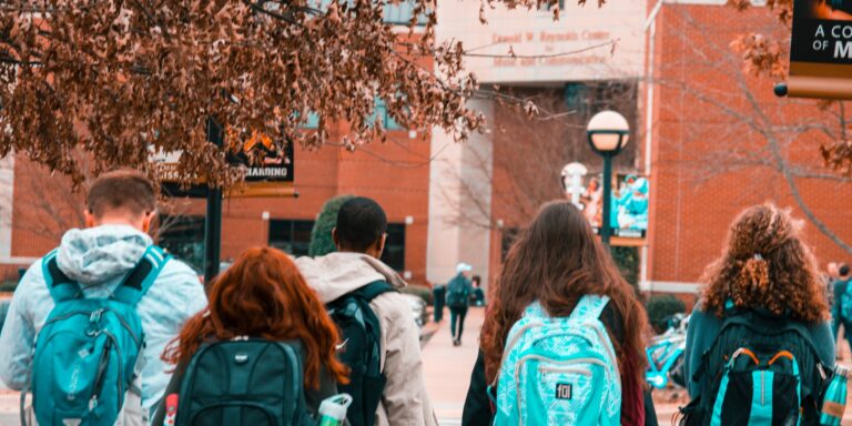 People Wearing Backpacks