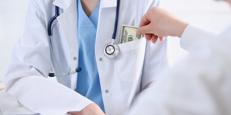 Anti-kickback statute as represented by a doctor receiving a bribe